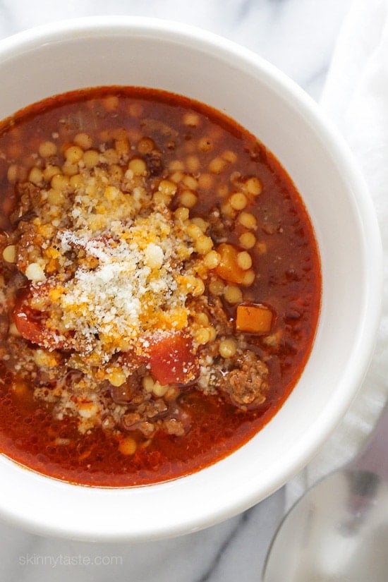 Beef, Tomato and Acini di Pepe Soup is one of my most popular soup recipes! My family DEVOURED this delicious bowl of soup made with ground beef, tomatoes, and tiny pasta. It's warm and comforting, like a great big hug on a cold winter day. Kid-friendly, freezer-friendly! #skinnytaste #soup #acinidepepe #kidfriendlysoup #freezerfriendlysoup #bestbeefsoup