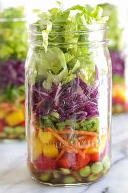 This colorful Asian-inspired salad is layered with edamame, bell peppers, carrots, snow peas, cabbage and lettuce and a simple sesame-soy vinaigrette. One jar is a huge serving, perfect for lunch or it can serve two as a side dish.