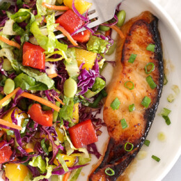 miso salmon with a colorful asian salad
