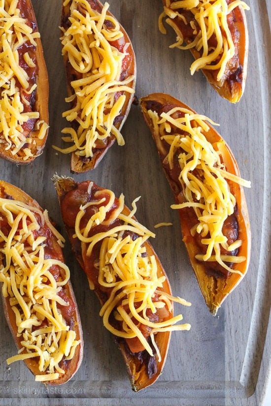 These cheesy baked sweet potato skins are loaded with fat free black refried beans, salsa and cheddar cheese. Just a few ingredients but they taste SO good!
