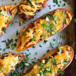 These cheesy baked sweet potato skins are loaded with fat free black refried beans, salsa and cheddar cheese. Just a few ingredients but they taste SO good!