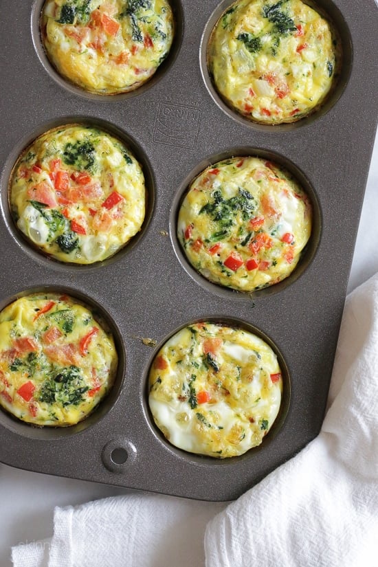 These easy, mini baked omelets are perfect to make ahead for the week. These muffins are inspired by my recent vacation to Beaches in Ochos Rios Jamaica. Every morning I would get an omelet with fresh fruit. The chef at the omelet station had all his ingredients prepped and quickly whipped up hundreds of omelets each morning to order. I used some of my favorite omelet ingredients but you can switch it up and add whatever you like or have on hand.