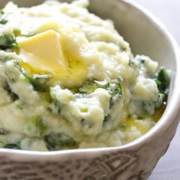 Colcannon is an Irish mashed potato dish mixed with greens and sometimes cabbage. This low-carb mash uses cauliflower in place of potatoes and added kale, which I have to say is really darn good!