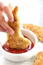 These juicy, flavorful chicken tenders are marinated in pickle juice then breaded and baked in the oven or air fryer!