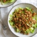 You know those yummy Asian Chicken Lettuce wraps often served as appetizers? Well this one is served over a big chopped salad! So tasty, and a great way to take an appetizer and turn it into a main dish salad!