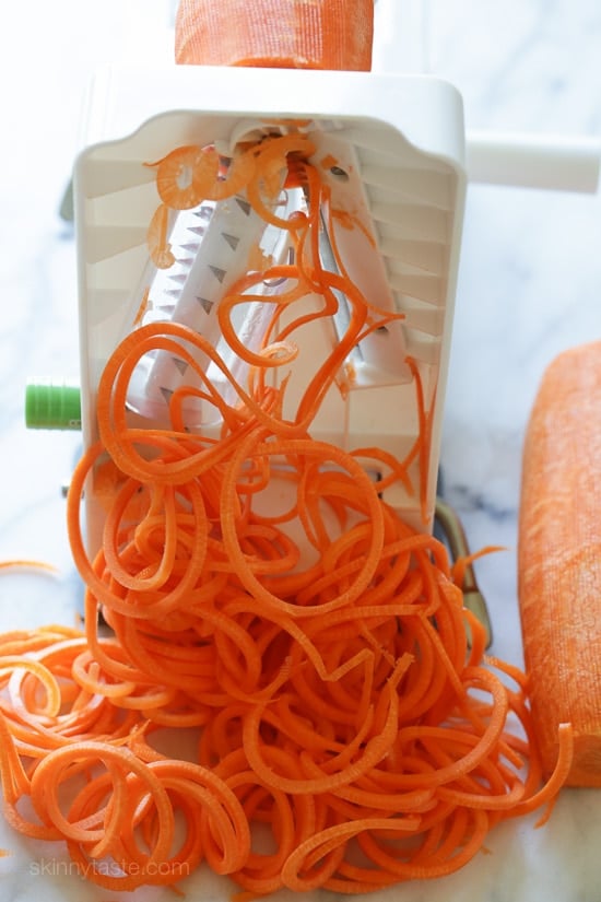 An easy 5-ingredient carrot salad that is lemony, bright and delicious! You don't need a spiralizer to make it, you can use pre-shredded carrots or use a potato peeler to cut the carrots into ribbons.