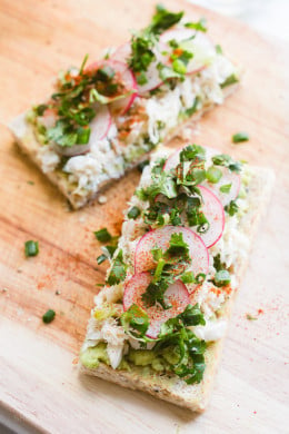 Fresh crab, sliced radishes, lime, paprika and cilantro elevate simple avocado toast to a whole new and delicious level!