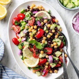 Garbanzo bean Mediterranean salad on serving platter.