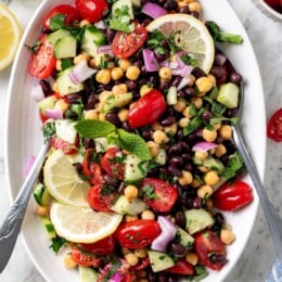 Garbanzo bean Mediterranean salad in serving bowl.