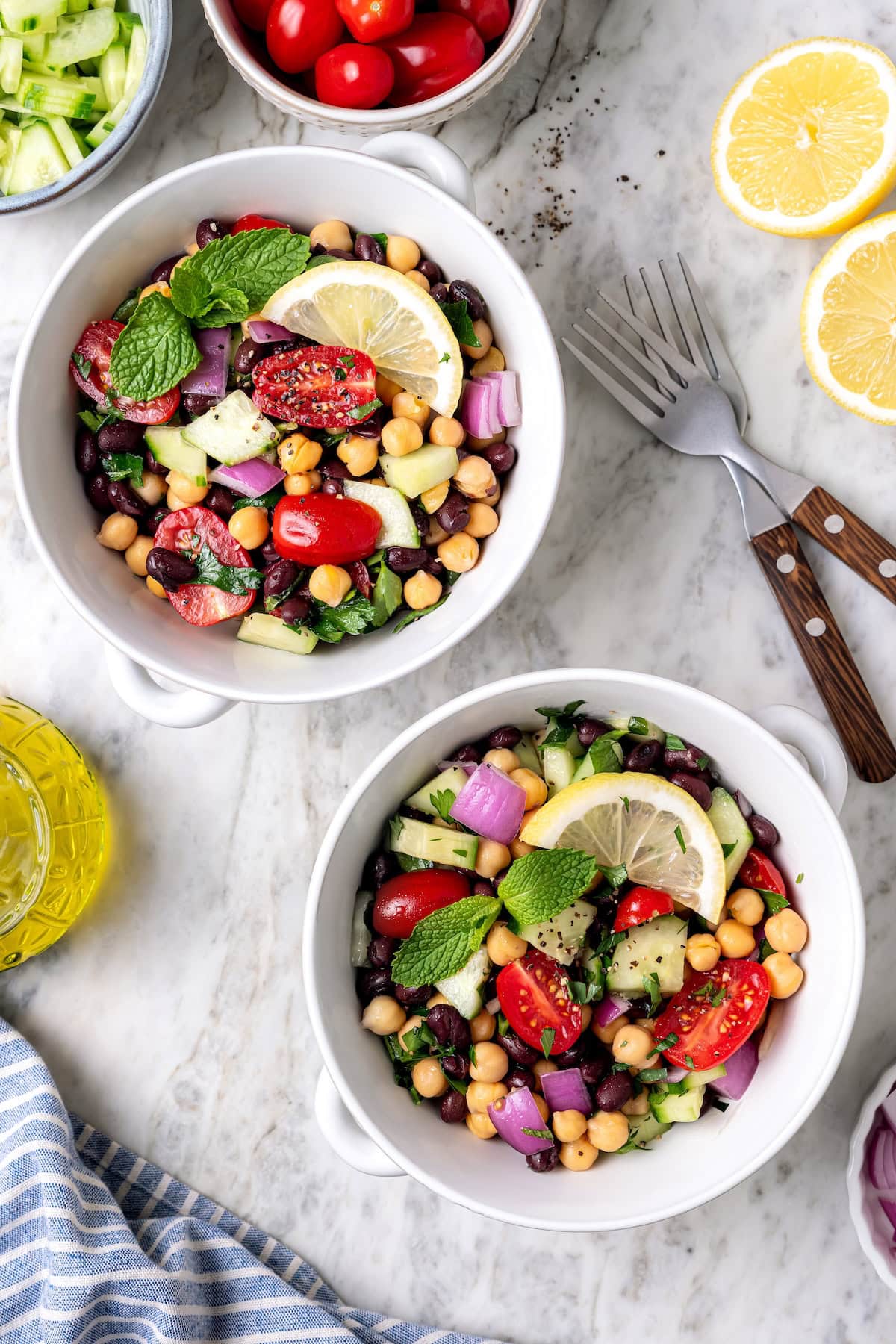 Garbanzo bean Mediterranean salad in two bowls.