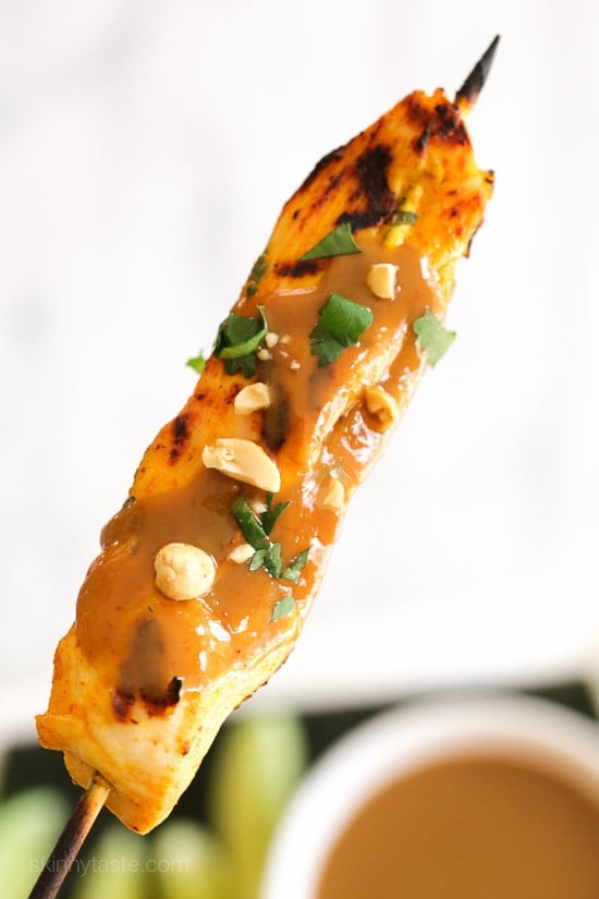 These flavorful chicken skewers are marinated in coconut milk and spices, then grilled and served with a delicious spicy peanut sauce for dipping.