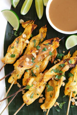 These easy, flavorful Thai inspired chicken skewers are marinated in coconut milk and spices, then grilled and served with a delicious spicy peanut sauce for dipping.
