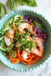These quick and easy Spiralized Summer Roll Bowls with Hoisin Peanut Sauce made with spiralized carrots and cucumbers were inspired by my shrimp summer rolls. I wanted to take those yummy rolls (which can be a bit more time consuming) and turn them into a super-quick meal, less than 10 minutes!