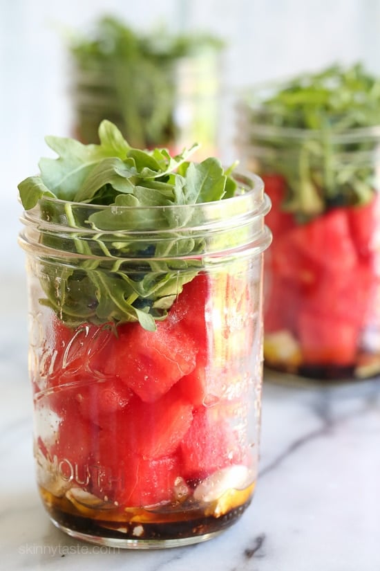 One of my favorite summer salad combinations is watermelon with feta, balsamic, red onion and arugula. It's so refreshing and light, and perfect to make in jars to take to the beach or park (I keep them chilled in cooler).
