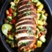  Blackened Chicken over a flavorful chickpea salad with fresh corn, tomatoes, avocado and lime juice. A quick and easy weeknight dish!