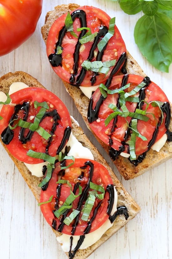 I've been taking advantage of the tomatoes and basil overflowing from my garden with these simple French bread pizzas. Only 5 ingredients, less than 10 minutes to make! Have them for lunch or dinner paired with a side salad.
