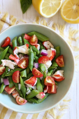 This delicious, easy salad features succulent lobster tossed with chopped asparagus and tomatoes in a light lemon dressing. To save time, I buy the lobsters steamed from my local fishmonger.