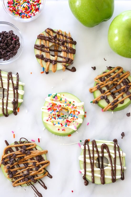 I'm in love with these apple treats, great for the kids or even adults. Drizzled with anything that strikes your fancy, here I did a variation with PB and chocolate as well as some with just chocolate. Caramel would also be great to give you a caramel apple combination!