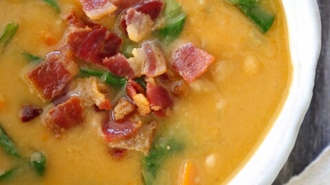 This delicious, hearty Navy Bean, Bacon and Spinach Soup is inexpensive and easy to make, plus leftovers are even better the next day!