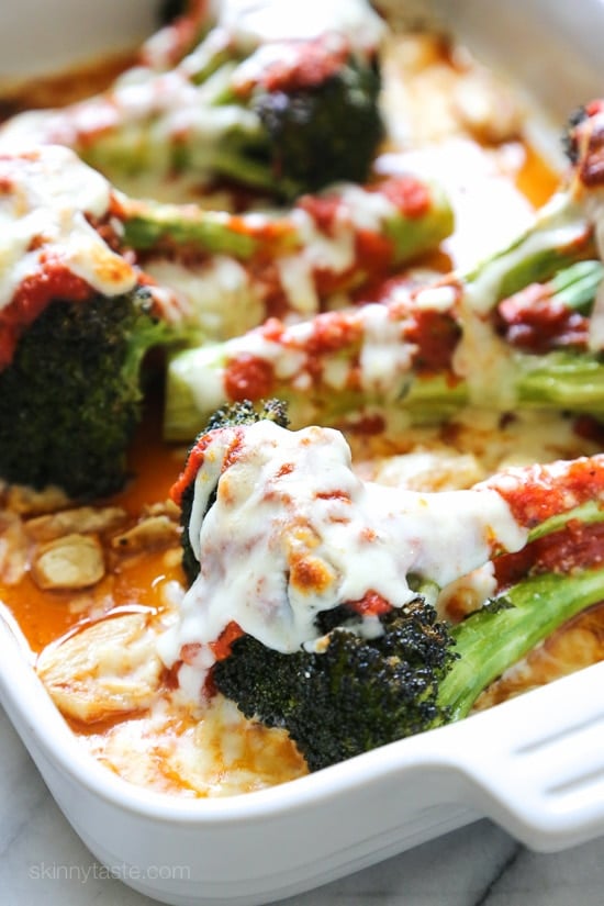 I gave one of my favorite veggies – roasted broccoli – the parmesan treatment (topped with with marinara and melted mozzarella)! If it works for eggplant, why not broccoli!