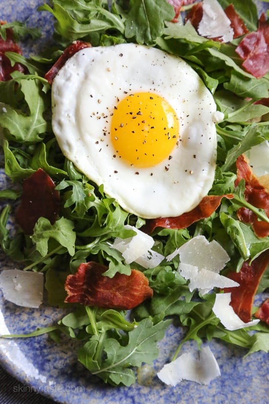 This easy salad has all my favorite things in one – arugula, Proscuitto, shaved Parmesan and a runny egg! When you pop that egg yolk, the salad is bathed in that warm eggy goodness, salad nirvana in every bite! If you are not a fan of runny eggs, hard boiled eggs would taste just fine too!