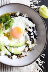 Eggs are not just for breakfast, I love them for lunch or dinner too! These flavorful protein-pack bowls topped with salsa verde, black beans, avocados and queso fresco.