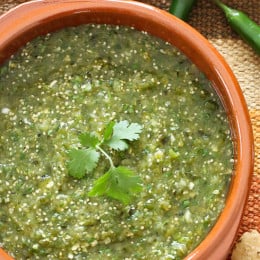 Salsa Verde is a fresh, healthy salsa made with roasted tomatillos, peppers, garlic, onion and cilantro. Perfect for dipping your tortilla chips into or used in recipes that call for jarred Salsa Verde.