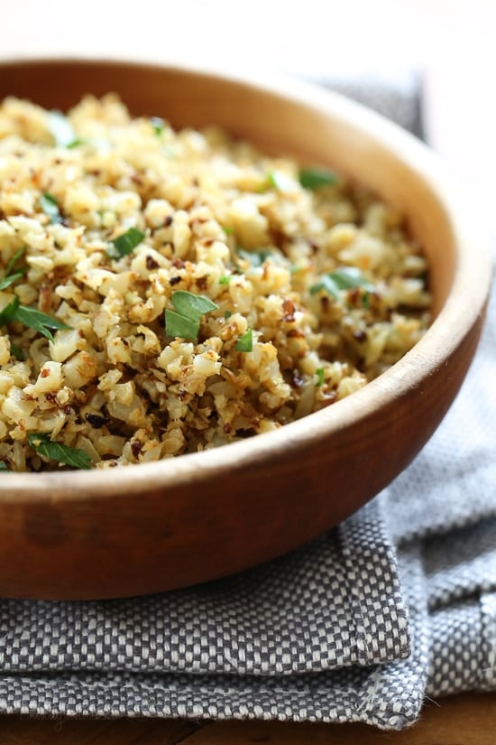 I love cauliflower "rice", and I love the nutty flavor of roasted cauliflower so I combined the two to make this easy low-carb side dish that goes great with just about anything from chicken, to steak or fish.