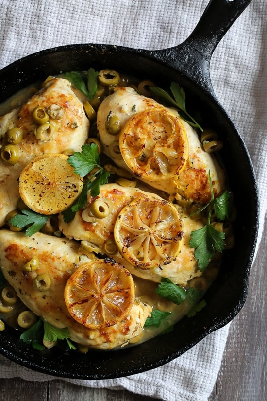 Bright and flavorful, pan seared chicken breasts get tossed with green olives, lemon and fresh herbs then is finished in the oven. Perfect served with bread or a green salad on the side.