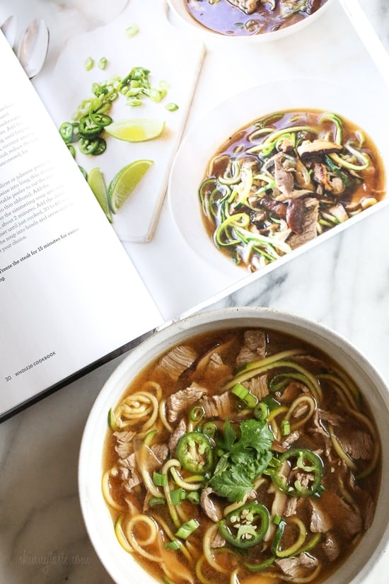 A quick, flavorful Vietnamese-inspired nood-less pho subs zucchini for rice noodles. So easy, the steak is sliced thin and cooks less than a minute in the ginger-garlic beef broth. Top this with fresh lime, basil, cilantro, jalapeno and scallions and you have one tasty soup!