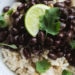 These simple and tasty black beans, flavored with bacon, onion, garlic, poblano and lots of spices, have smoky yet mild taste that pair well with lots of dishes.