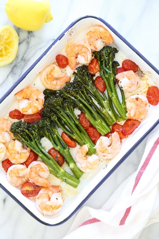 Sheet Pan Shrimp with Broccolini and Tomatoes is perfect for busy weeknights! One of my favorite ways to make shrimp is roasted in the oven, it comes out tender and flavorful every time! I added some of our favorite vegetables to make it a ONE-pan meal, and we loved it! A quick and EASY low-carb dish with tons of flavor, ready in under 30 minutes start to finish.