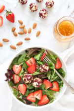 This beautiful Spring Berry Salad with Almond-Cranberry Crusted Goat Cheese is studded with strawberries and served over baby greens, but you can use any seasonal berries or a combination of berries instead. Serve this salad alone or alongside grilled chicken or fish.
