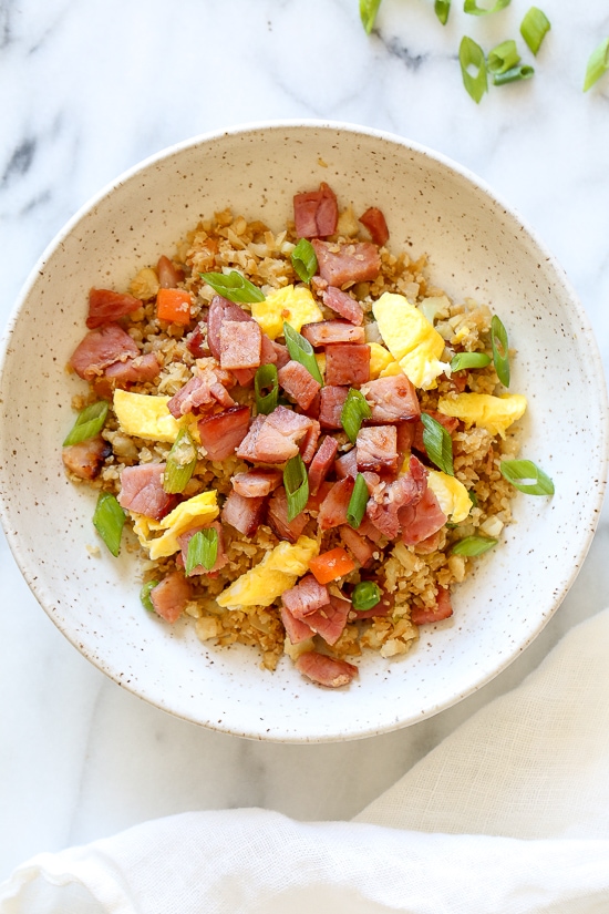 Cauliflower Fried "Rice" with Leftover Ham is a great way to use up that leftover ham from the Holidays, without the calories and carbs you may have over-indulged on.