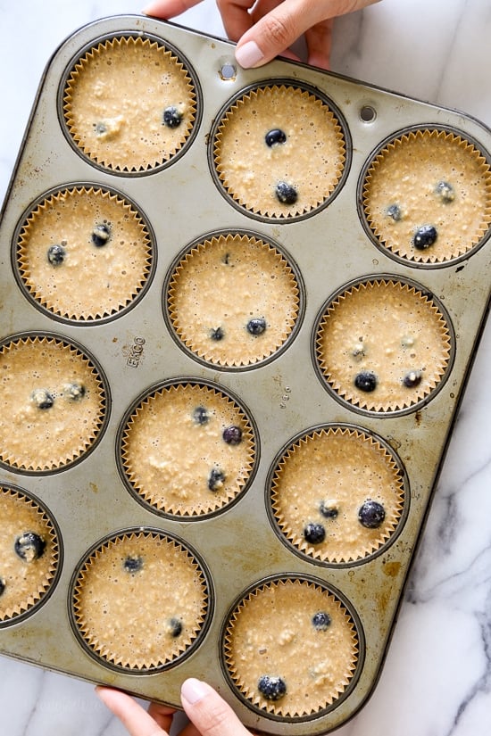 These Gluten-Free, Dairy-Free, Blueberry Oatmeal Muffins are insanely good. So moist, and lightly sweetened, studded with blueberries in every bite!