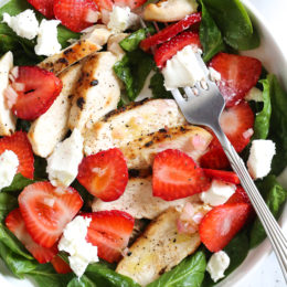 Grilled Chicken Salad with Strawberries and Spinach is made with creamy goat cheese and a white balsamic dressing, but this would also be great with Feta cheese and if you want to add more protein, or skip the cheese add walnuts or slivered almonds.