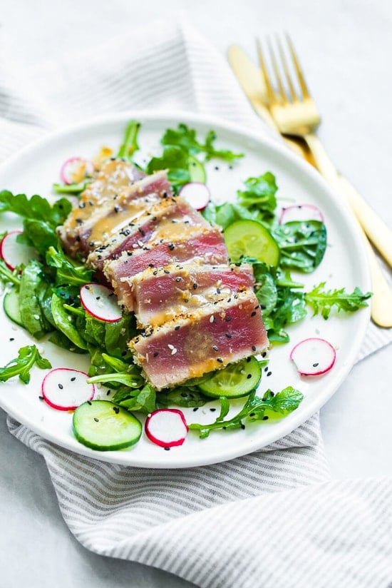 This panko and sesame crusted seared tuna on a bed of arugula and spinach salad, all topped with a wasabi butter sauce, takes Japanese food to whole new level! 