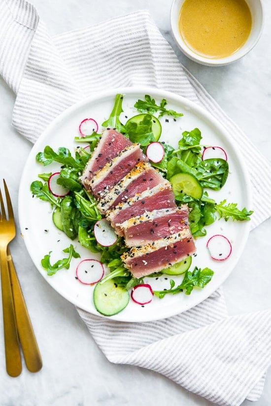 This panko and sesame crusted seared tuna on a bed of arugula and spinach salad, all topped with a wasabi butter sauce, takes Japanese food to whole new level! 