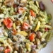 One bite of this Balsamic Roasted Veggie and White Bean Pasta and you'll want to make it all summer long! It's LOADED with veggies in every bite and finished with pesto and white beans. Roasted zucchini, yellow squash, zucchini, cherry tomatoes, red onion, mushrooms, peppers, and broccoli – SO good, and picky husband approved!