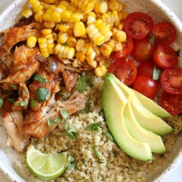 These Chipotle Chicken Bowls with Cilantro Lime Quinoa are so easy to make and have tons of flavor! I like to make them with chicken thighs but if you prefer white meat, chicken breast would work too. Extra limes for squeezing on top are recommended!