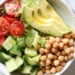 This Chickpea and Avocado salad is my go-to lunch when I need something fast and healthy! I load it up with garden vegetables and top it with a little olive oil and lemon, or olive oil and vinegar depending on my mood. Super simple, fresh and fills me up!