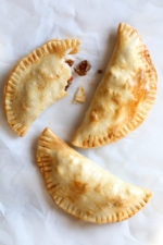 These easy beef empanadas made with my homemade beef picadillo filling and store bought empanada dough are "fried" in the air fryer for empanadas that area ready in minutes (only takes 8 minutes to cook)!