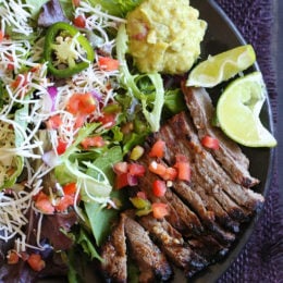 This Carne Asada steak salad is made with everything I love – juicy steak, pico de gallo, Monterey Jack cheese and guacamole.