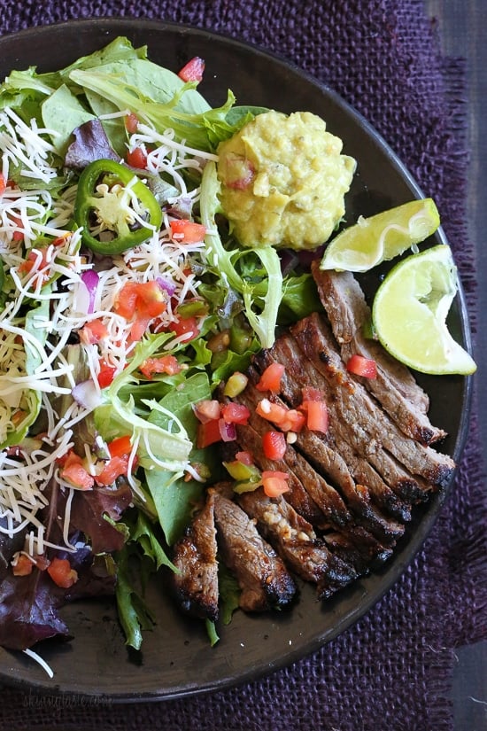 This Carne Asada steak salad is made with everything I love – juicy steak, pico de gallo, Monterey Jack cheese and guacamole. Inspired by my favorite taco salad, it's quick, tasty, low-carb and high in protein which fills you up and leaves you satisfied.