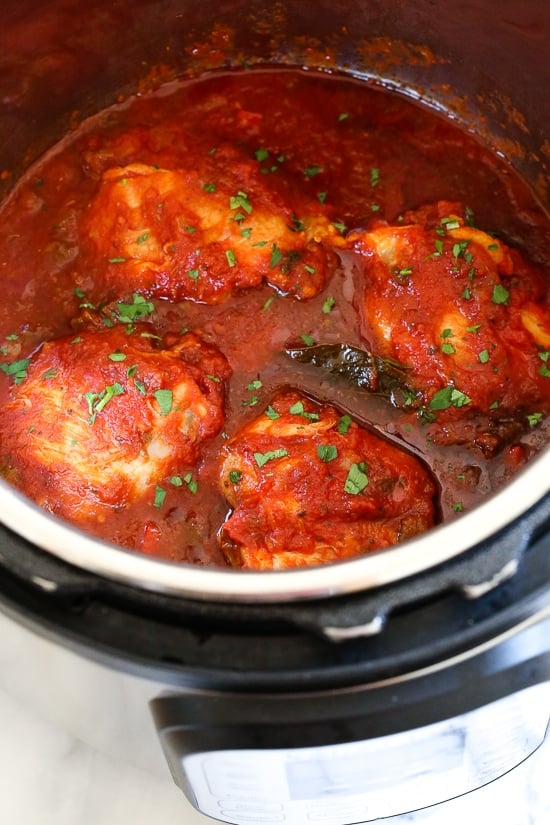 Chicken Cacciatore made in an Instant! The sauce is hearty and chunky, loaded with chicken, tomatoes, peppers and onions ( sometimes I add mushrooms too!) Great over pasta, squashta, rice or polenta.