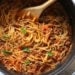 This EASY Spaghetti and Meat Sauce is cooked all in one pot! The meat sauce is made from scratch on the stove and cooked with the spaghetti all at the same time. No extra pots to wash, fast and delicious!