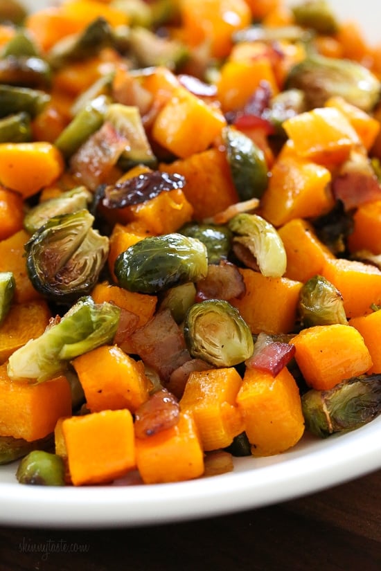 Roasted Brussels Sprouts and Butternut Squash are delicious on their own, but adding bacon and a maple soy glaze makes them over-the-top delicious! Made all on one sheet pan, you can double or triple this recipe to feed a crowd by adding more sheet pans.