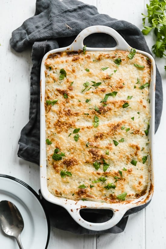 This fast and fresh vegetarian Shepherd’s Pie made with Portobello mushroom, carrots, peas, corn, and onions, all topped with leftover Skinny Garlic Mashed Potatoes, is the perfect after-Holiday fix.