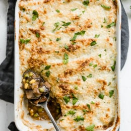 This fast and fresh vegetarian Shepherd’s Pie made with Portobello mushroom, carrots, peas, corn, and onions, all topped with leftover Skinny Garlic Mashed Potatoes, is the perfect after-Holiday fix.