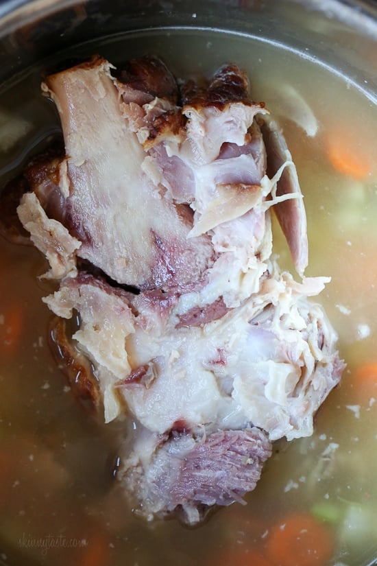 If you're making a big bone-in ham for the holidays this year, don’t throw away the leftover ham bone once all the meat’s been cut off. It’s a key ingredient in this soup that adds instant flavor with minimal effort! Here I added some vegetables, potatoes and cabbage, there are no beans but you can add some if you wish. So delicious and easy to make!